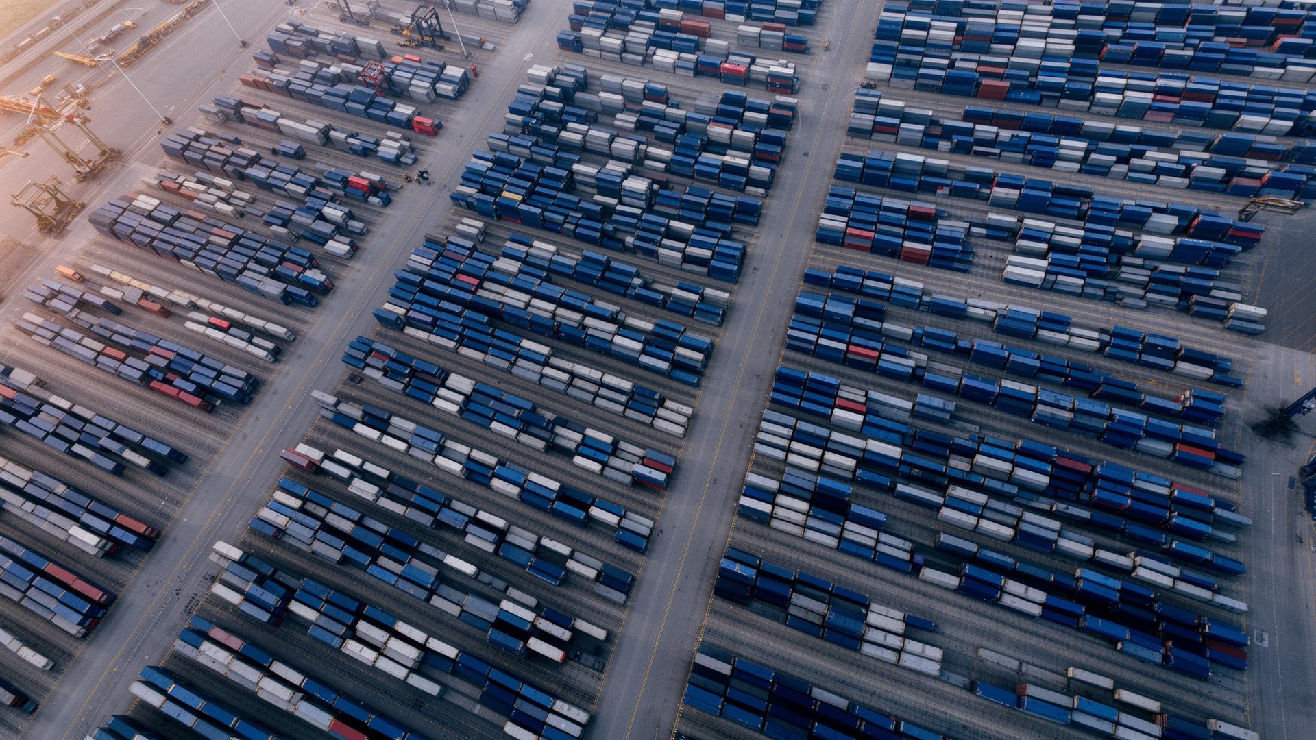 Aerial view of an organized shipping port representing global procurement operations